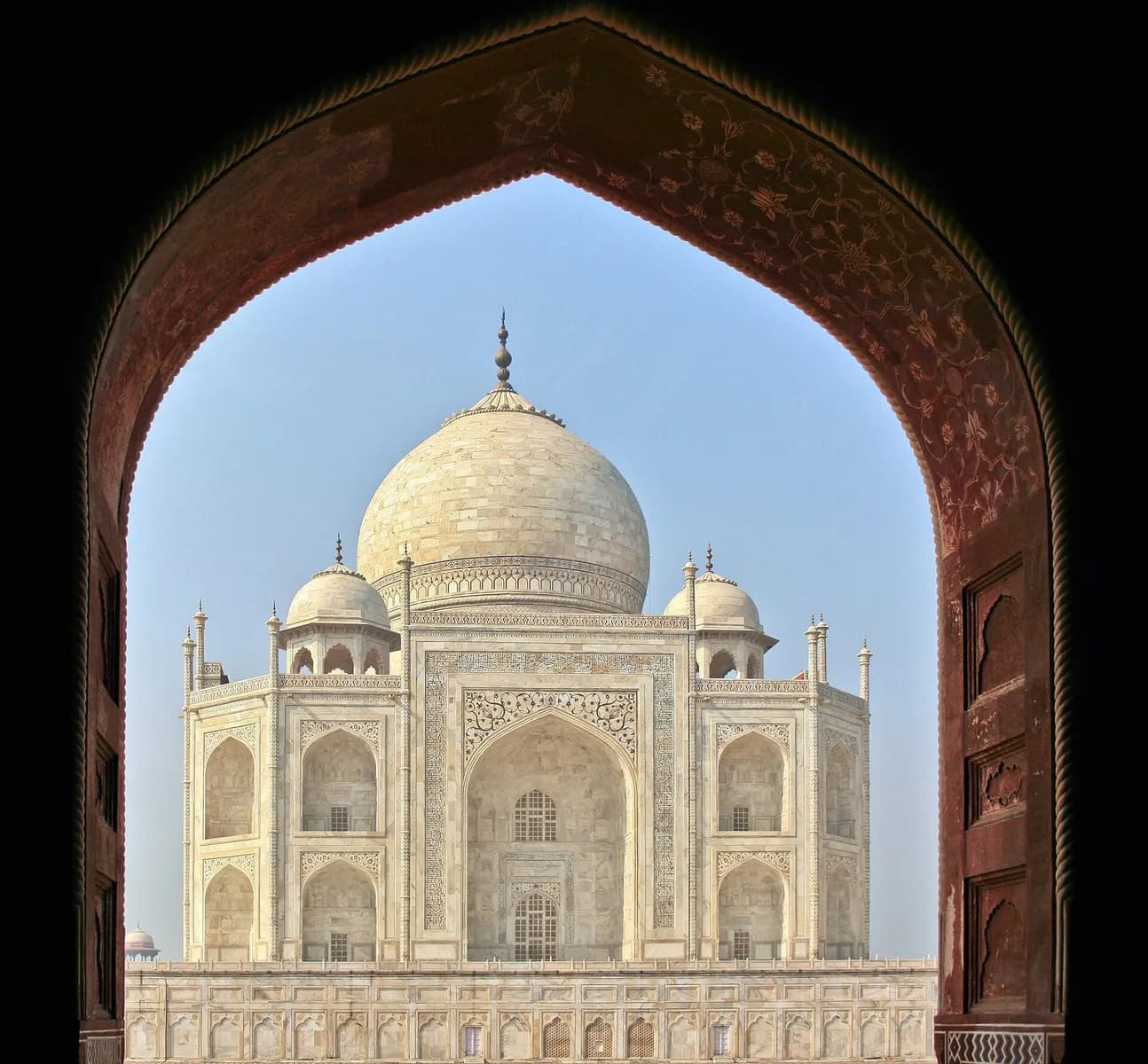 Taj Mahal framed by an arch in Agra, Uttar Pradesh