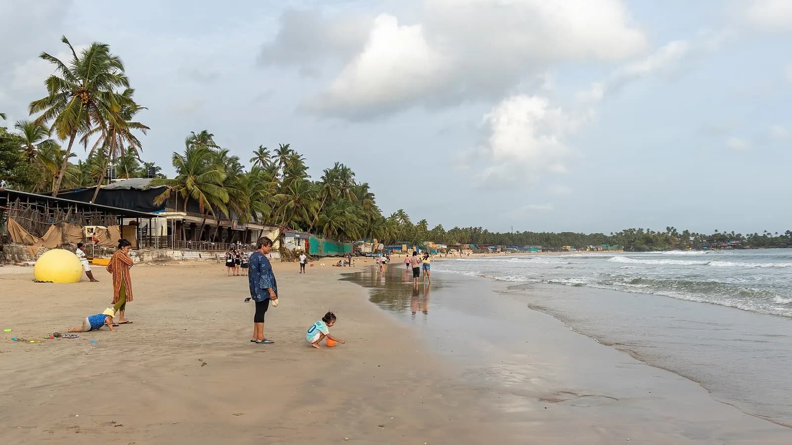 Visitors at Palolem Beach in South Goa